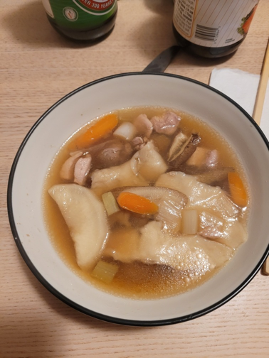 Hittsumi -- chicken and hand-torn dumplings. A bowl with a light-colored broth, vegetable and dumplings.